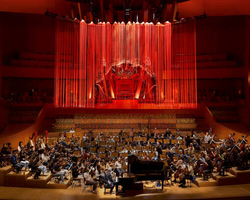 color-shifting light sculpture suspends above orchestra at walt disney concert hall
